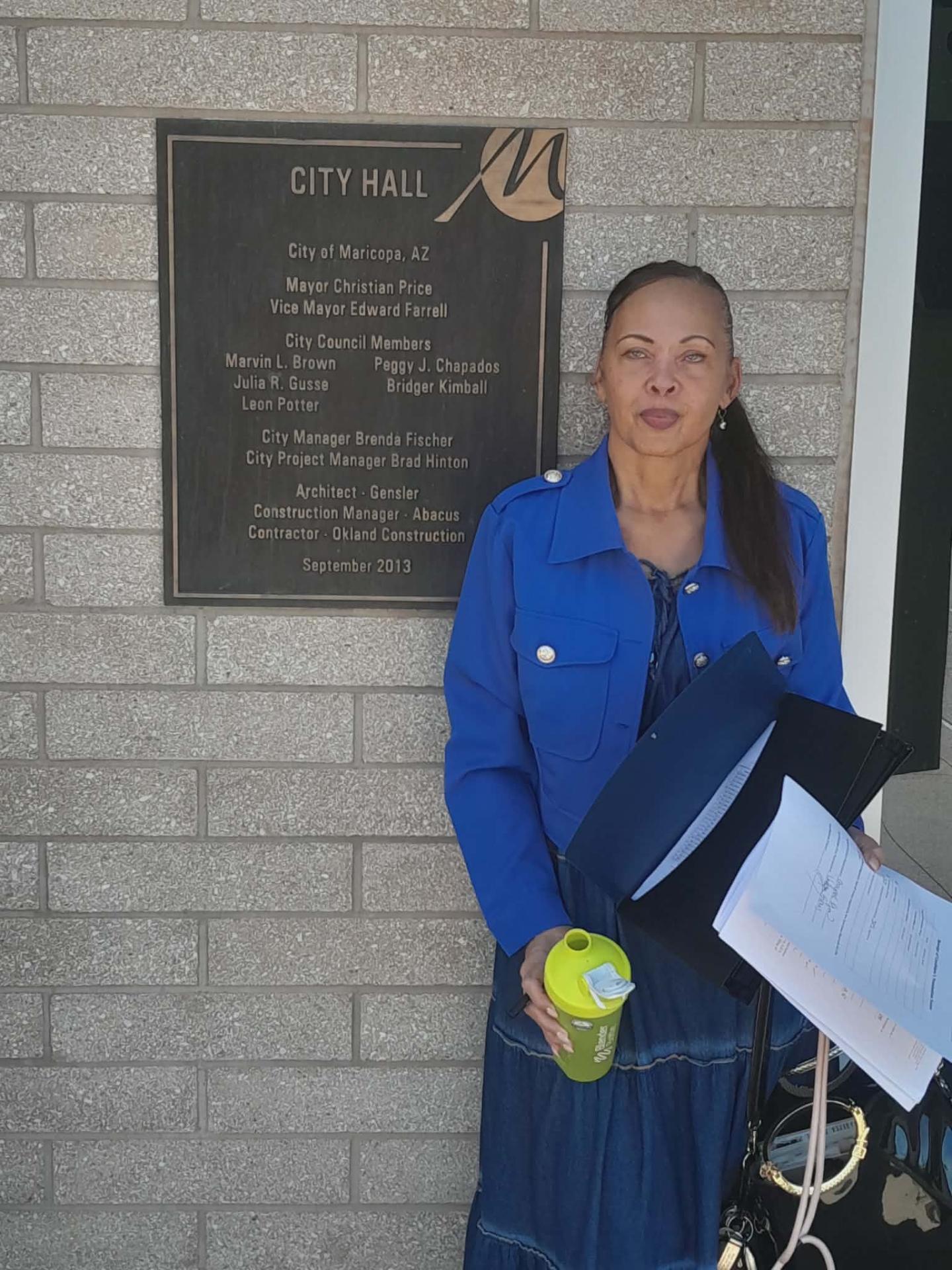 Chrystal outside City of Maricopa City Hall